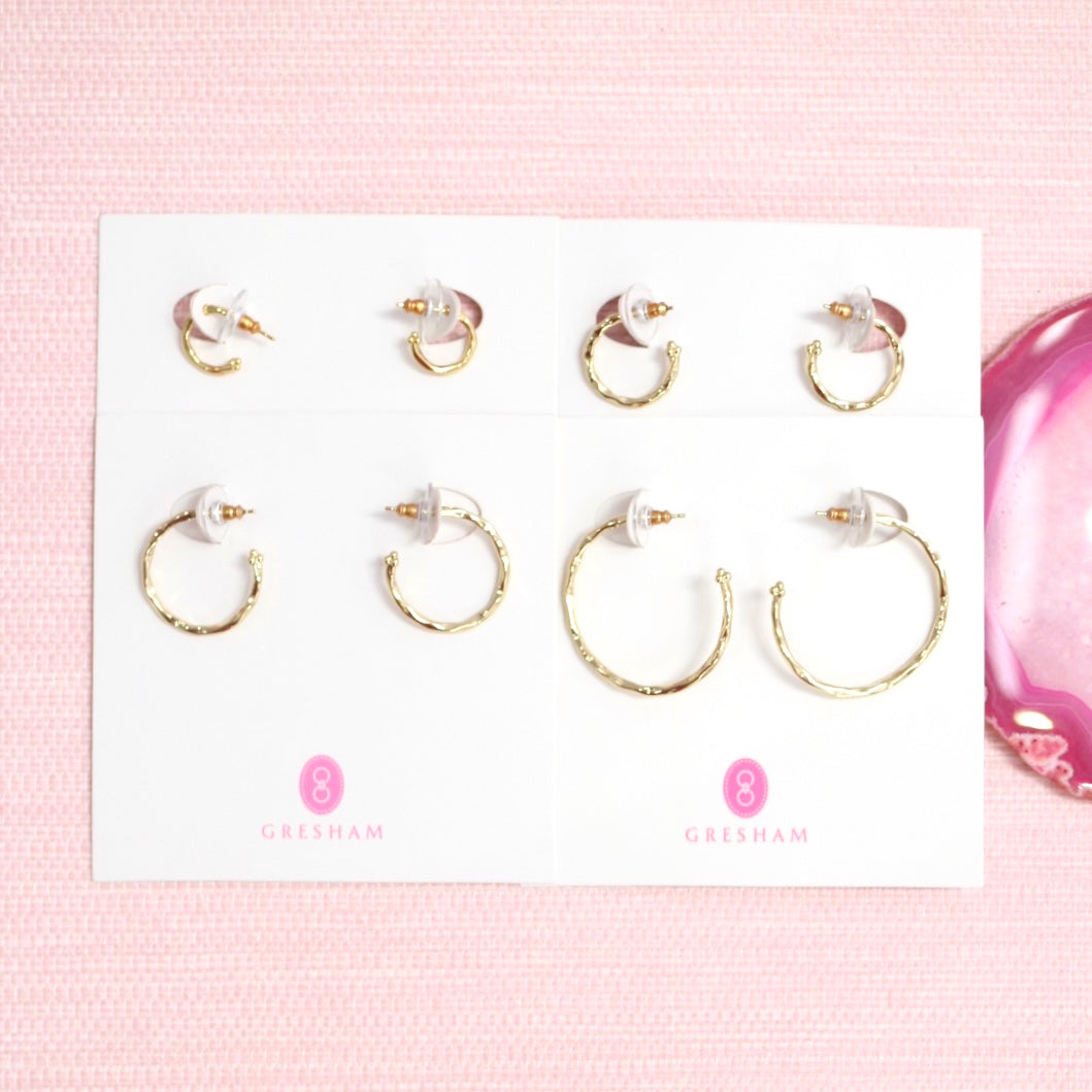 Mia hoop earring set in assorted sizes on a white display card