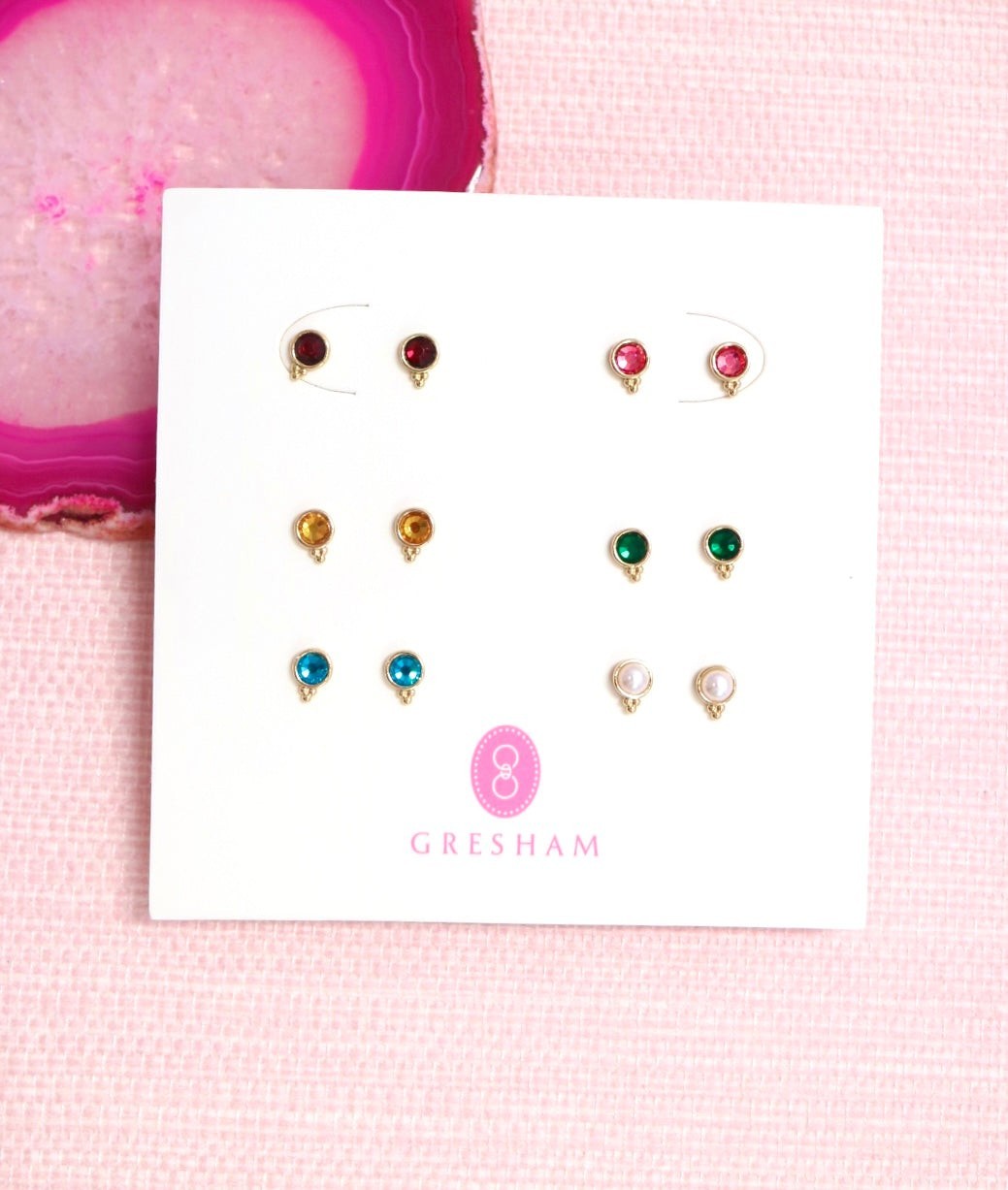 Fortuna stud earring set on a white Gresham display card