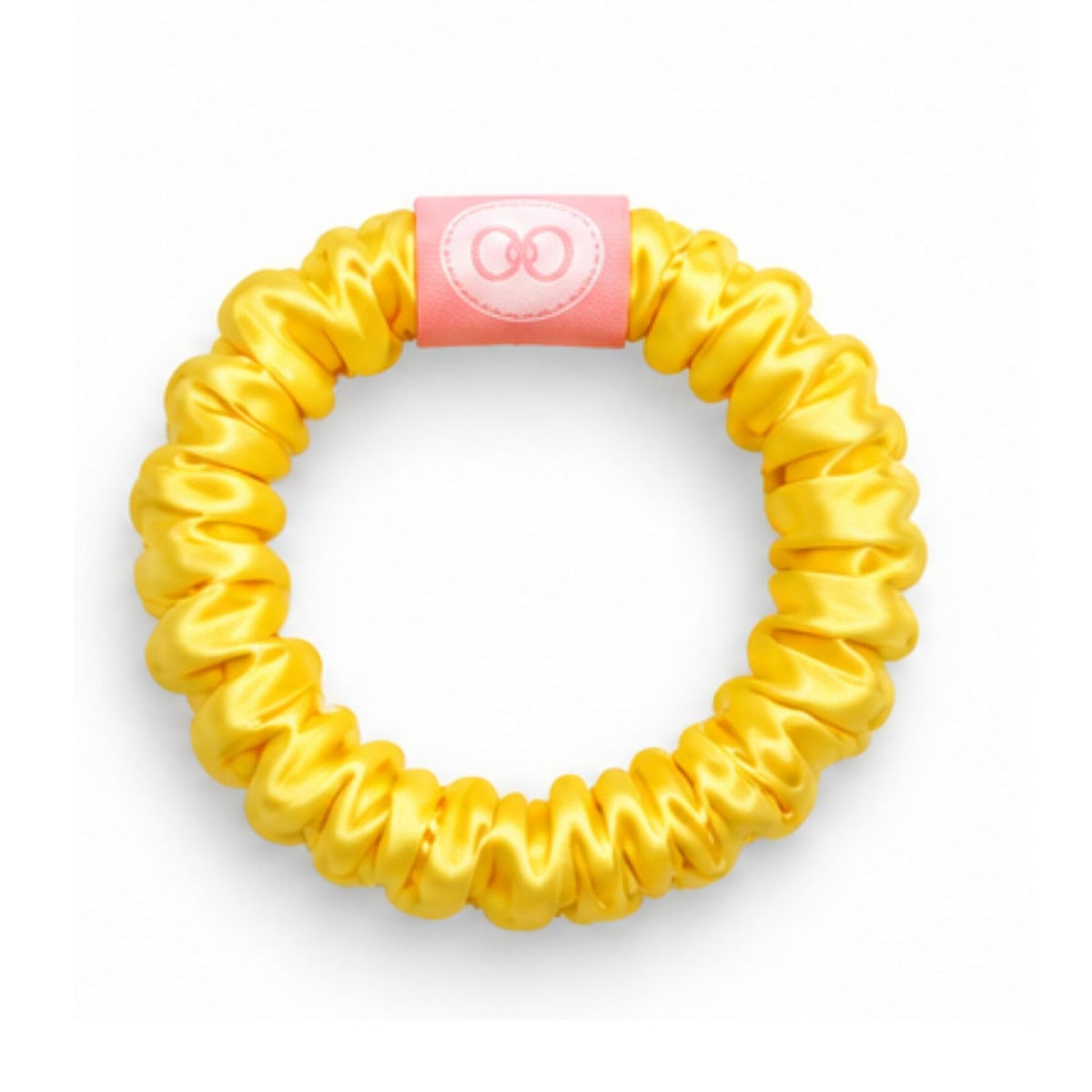 Yellow scrunchie with a pink logo tab