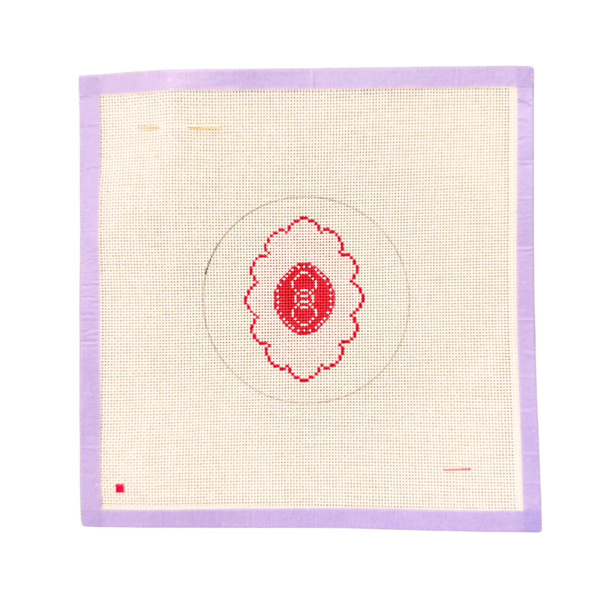 GJ Logo Round needlepoint canvas with a pink scallop emblem