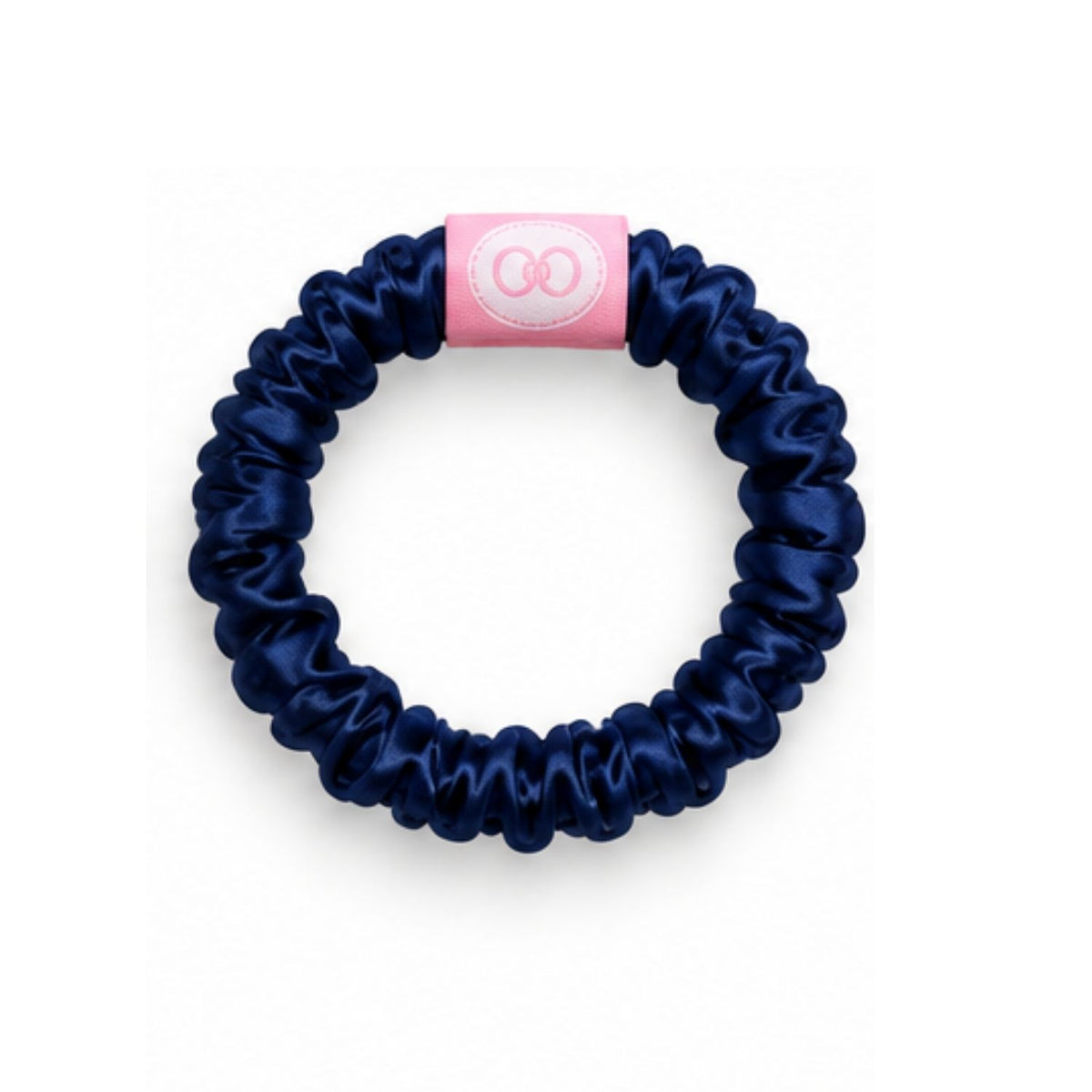 Navy scrunchie with a pink logo tab