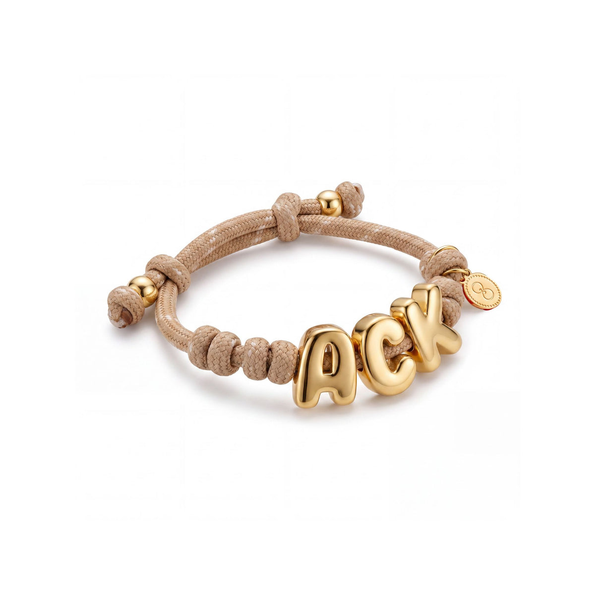 Tan paracord bracelet with gold ACK letters
