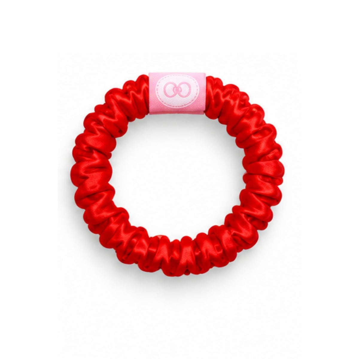 Red scrunchie with a pink logo tab