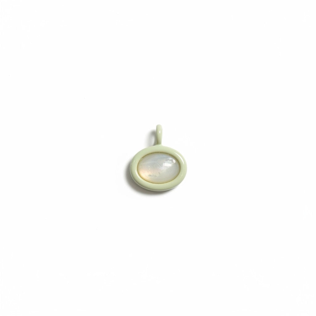 Bolla oval charm with a pale green enamel border