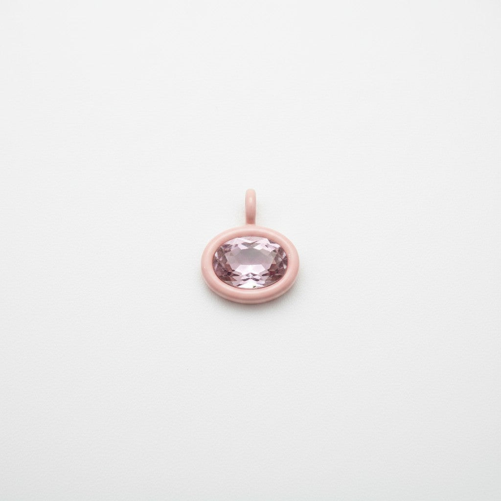 Bolla oval charm with a pale pink enamel border