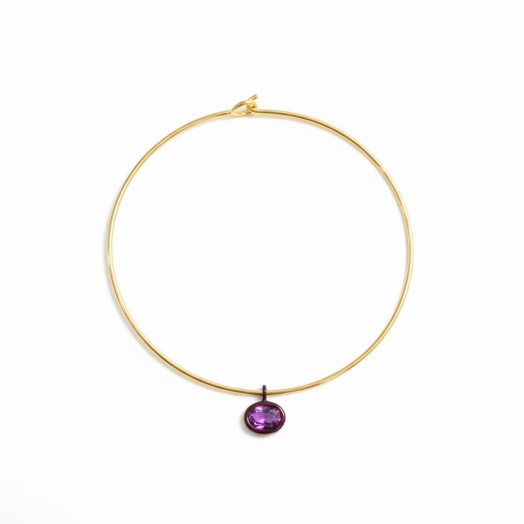 Gold Mida collar with a purple Bolla charm