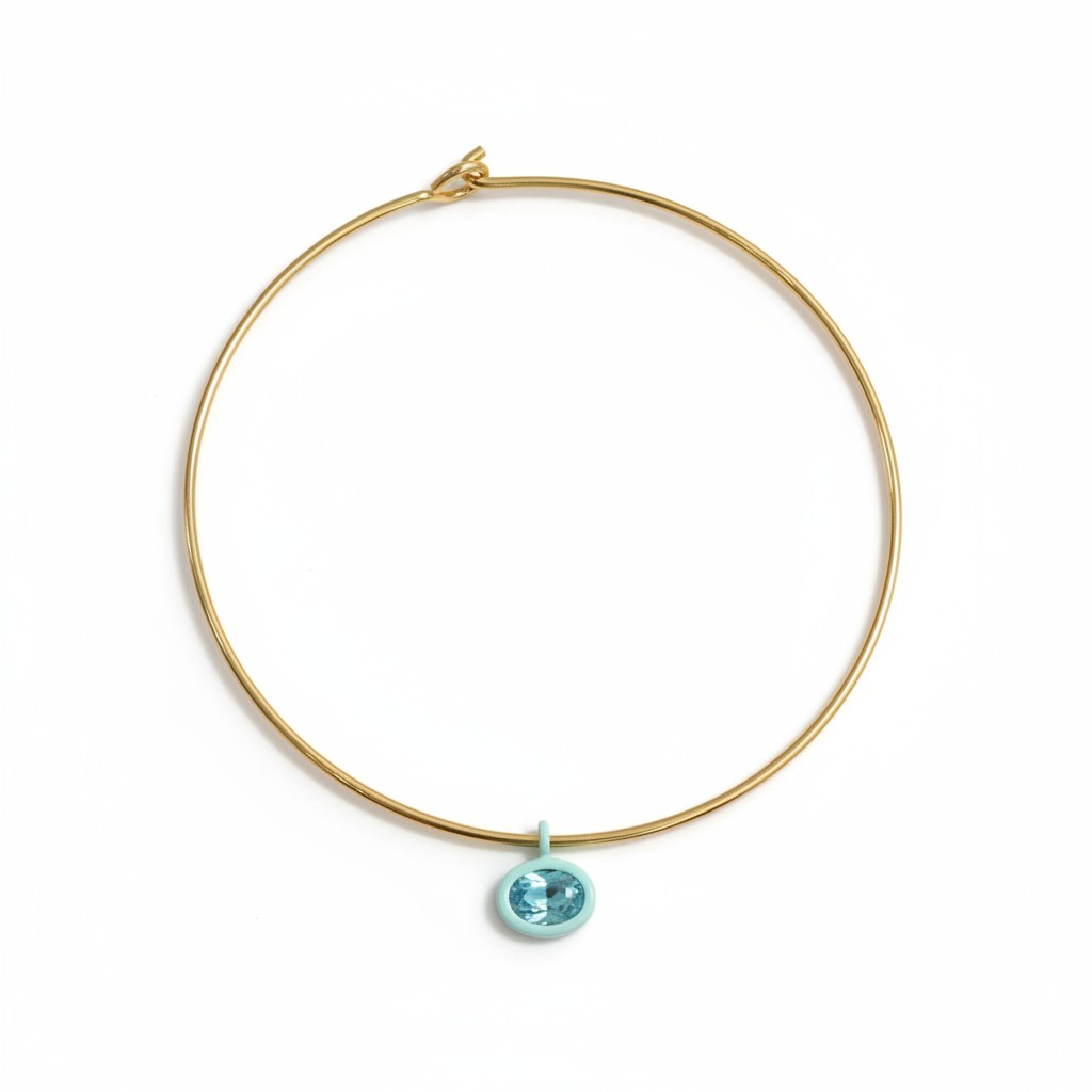 Gold Mida collar with a pale blue Bolla charm