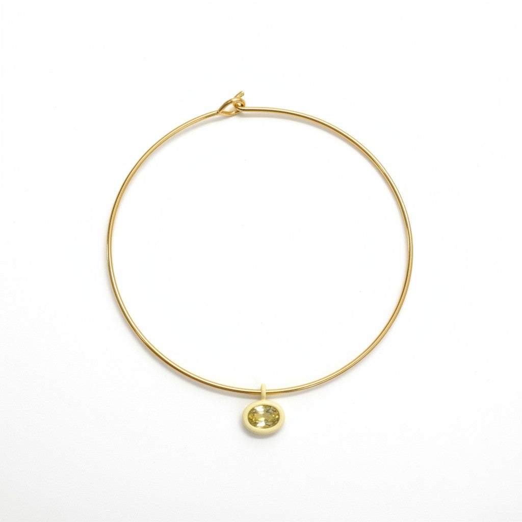 Gold Mida collar with a yellow Bolla charm