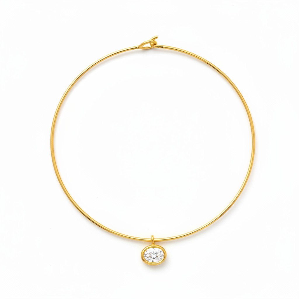Gold Mida collar with a pale green Bolla charm