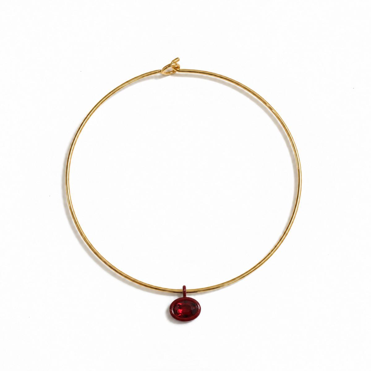 Gold Mida collar with a deep red Bolla charm