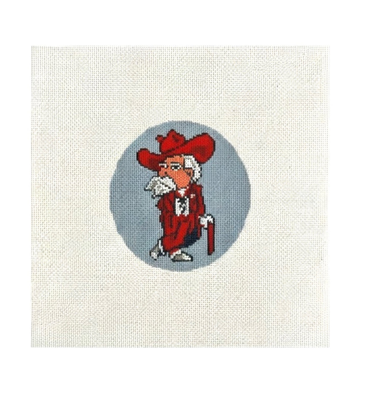 Col. Reb needlepoint character on a blue circle