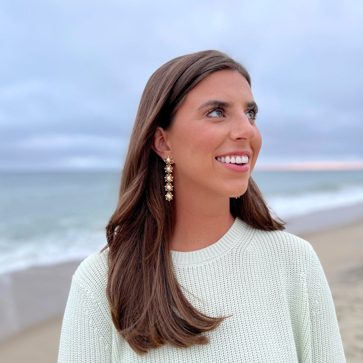 Woman wearing Perla Earrings by Gresham Jewelry