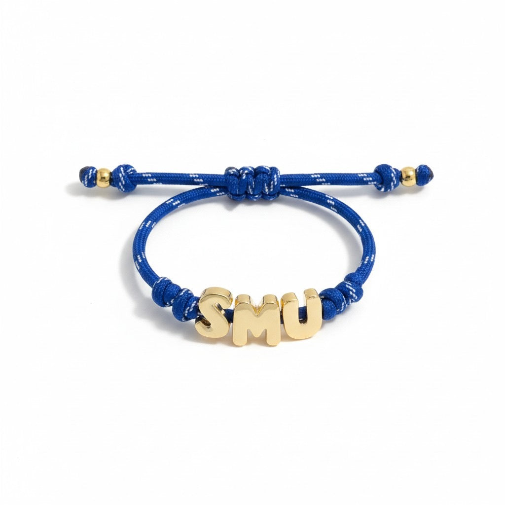 Blue paracord bracelet with gold SMU letters
