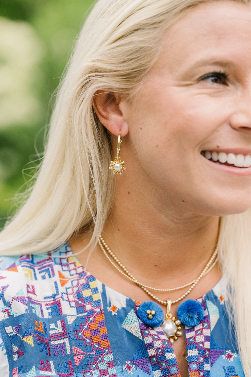 Mia Hoops with Perla charms styled on Mia Hoops, worn on a model