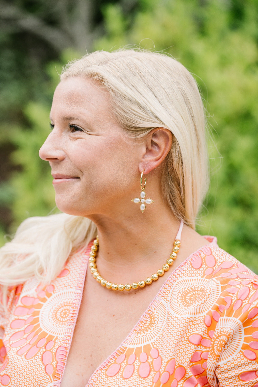 Custom Charm Mia Hoop Earring styled on a model