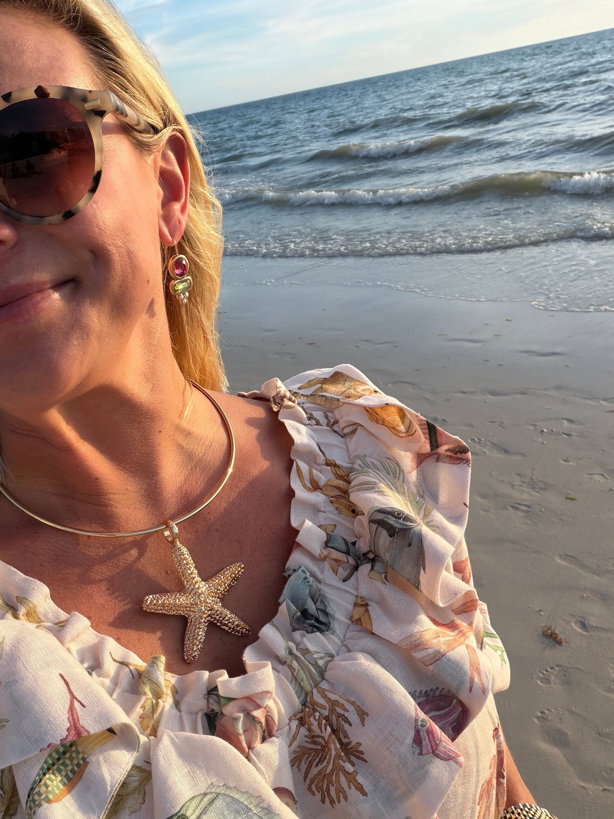 Woman wearing Starfish Pendant by Gresham Jewelry