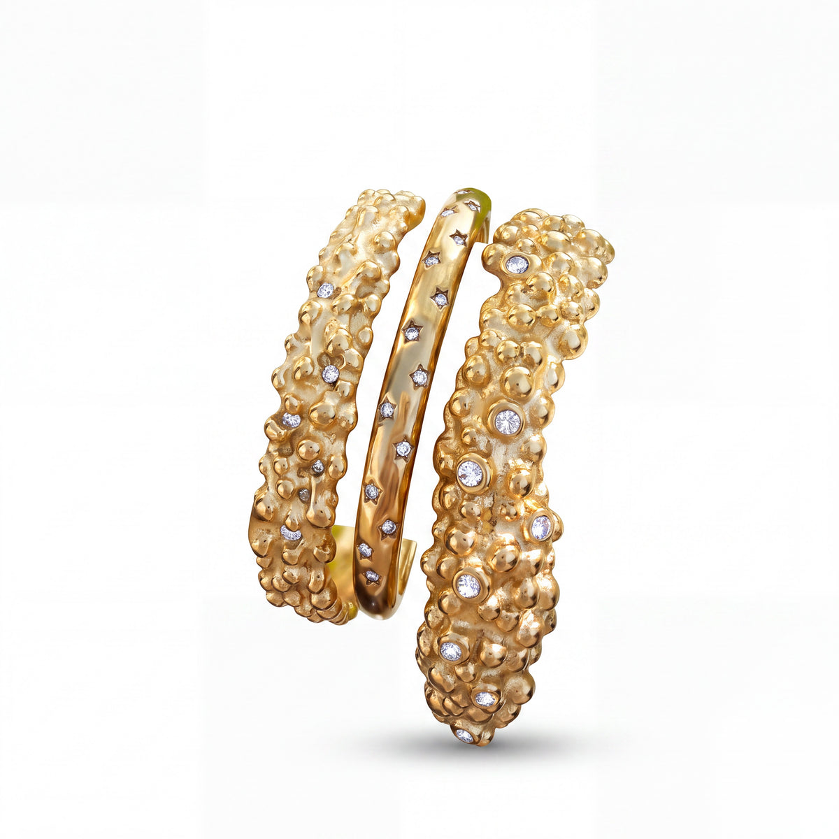 Two textured Riva cuffs with raised pebble details