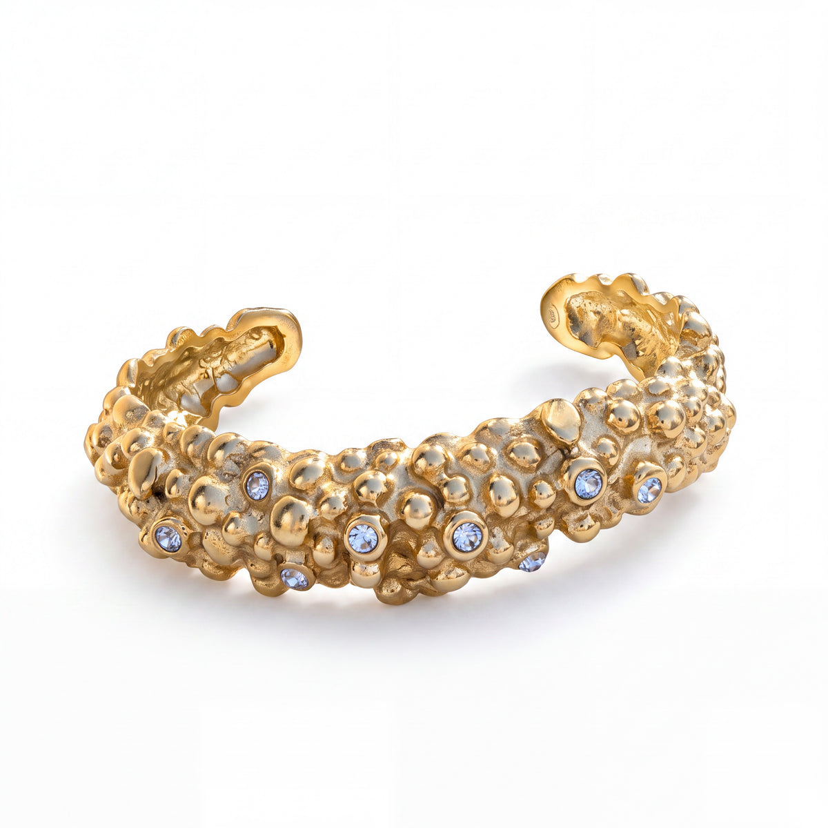 Large Riva cuff with raised pebble details and small stones