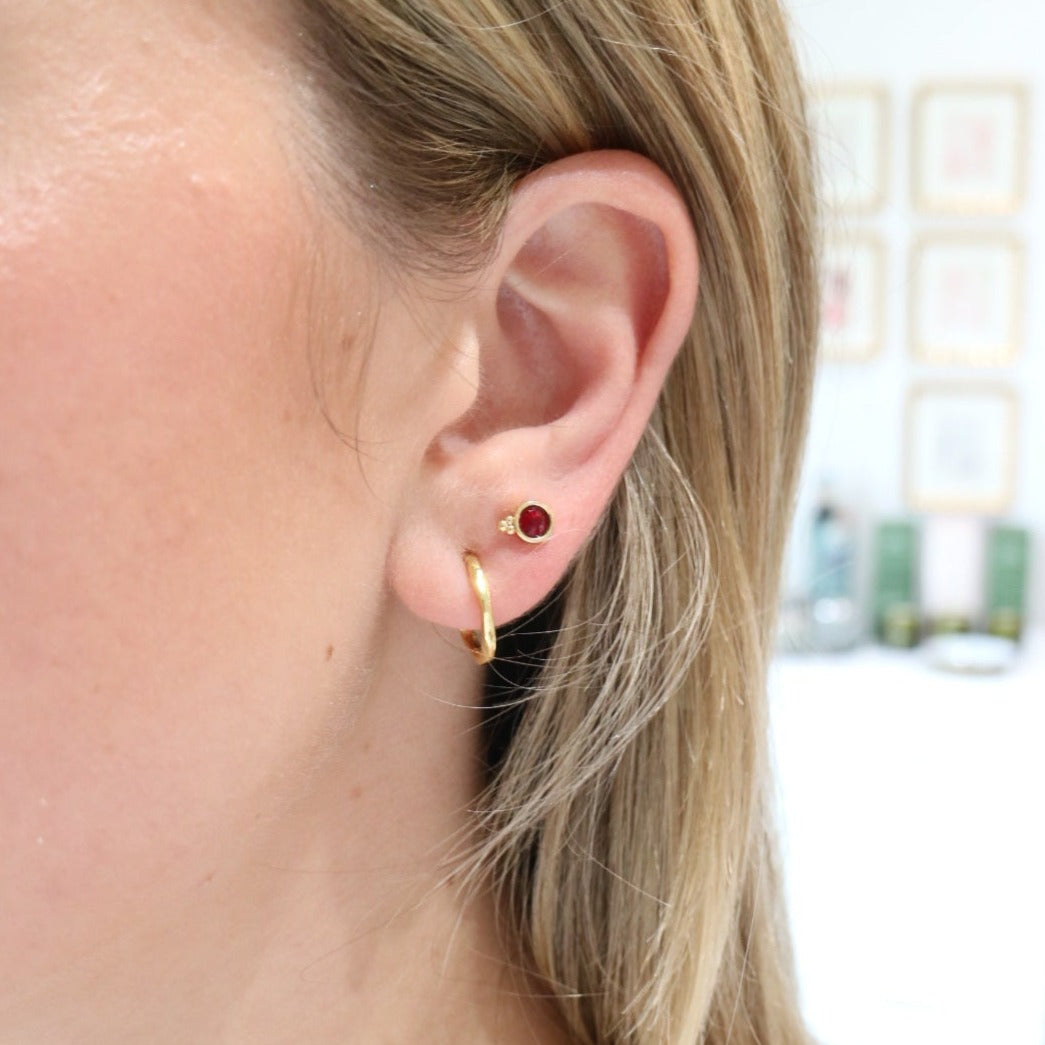Woman wearing Fortuna Studs by Gresham Jewelry