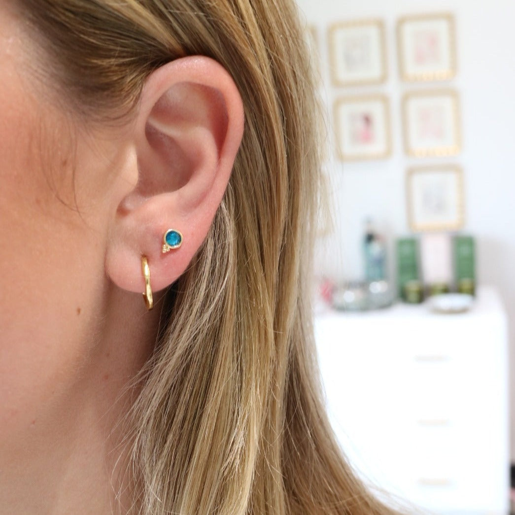 Woman wearing Fortuna Studs by Gresham Jewelry