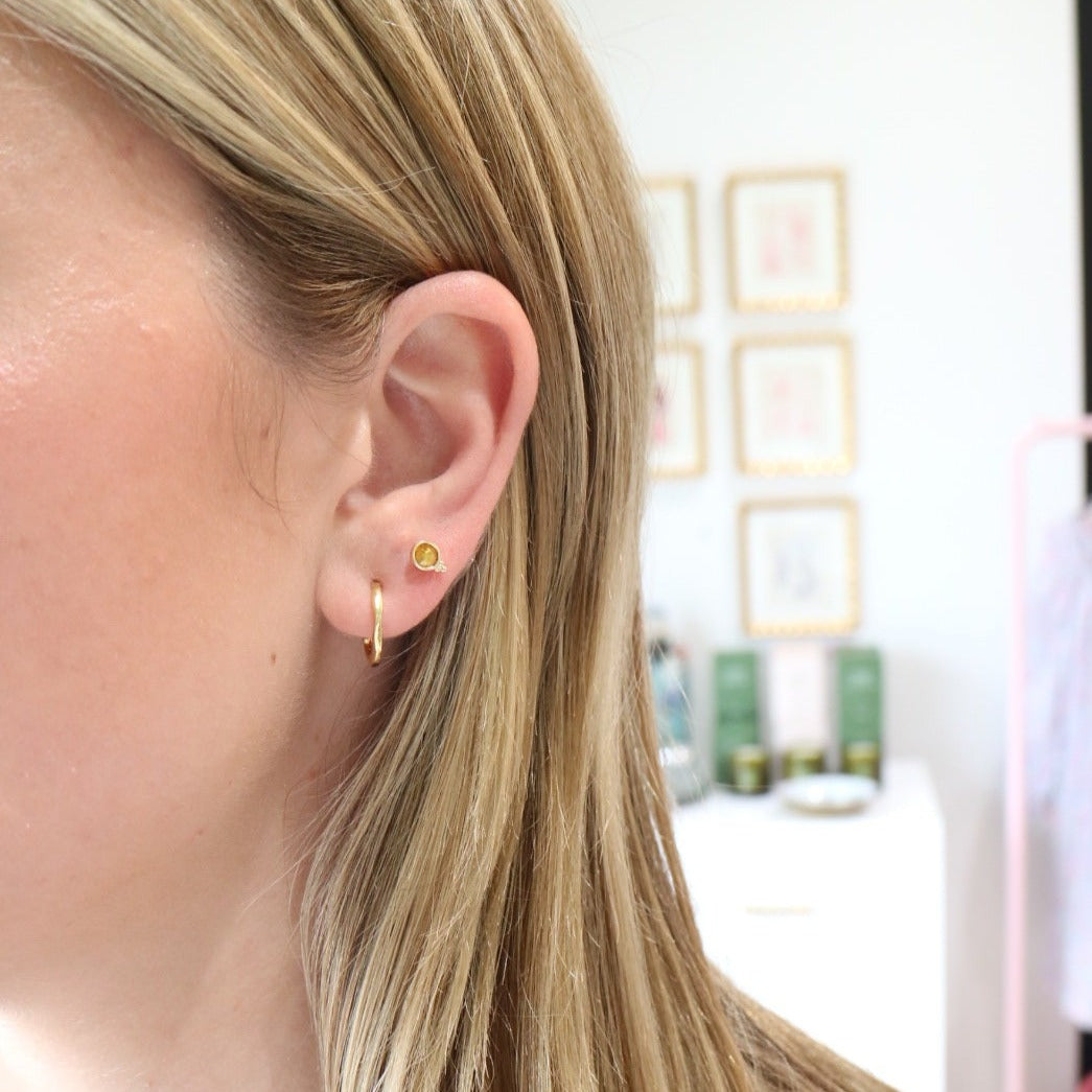 Woman wearing Fortuna Studs by Gresham Jewelry