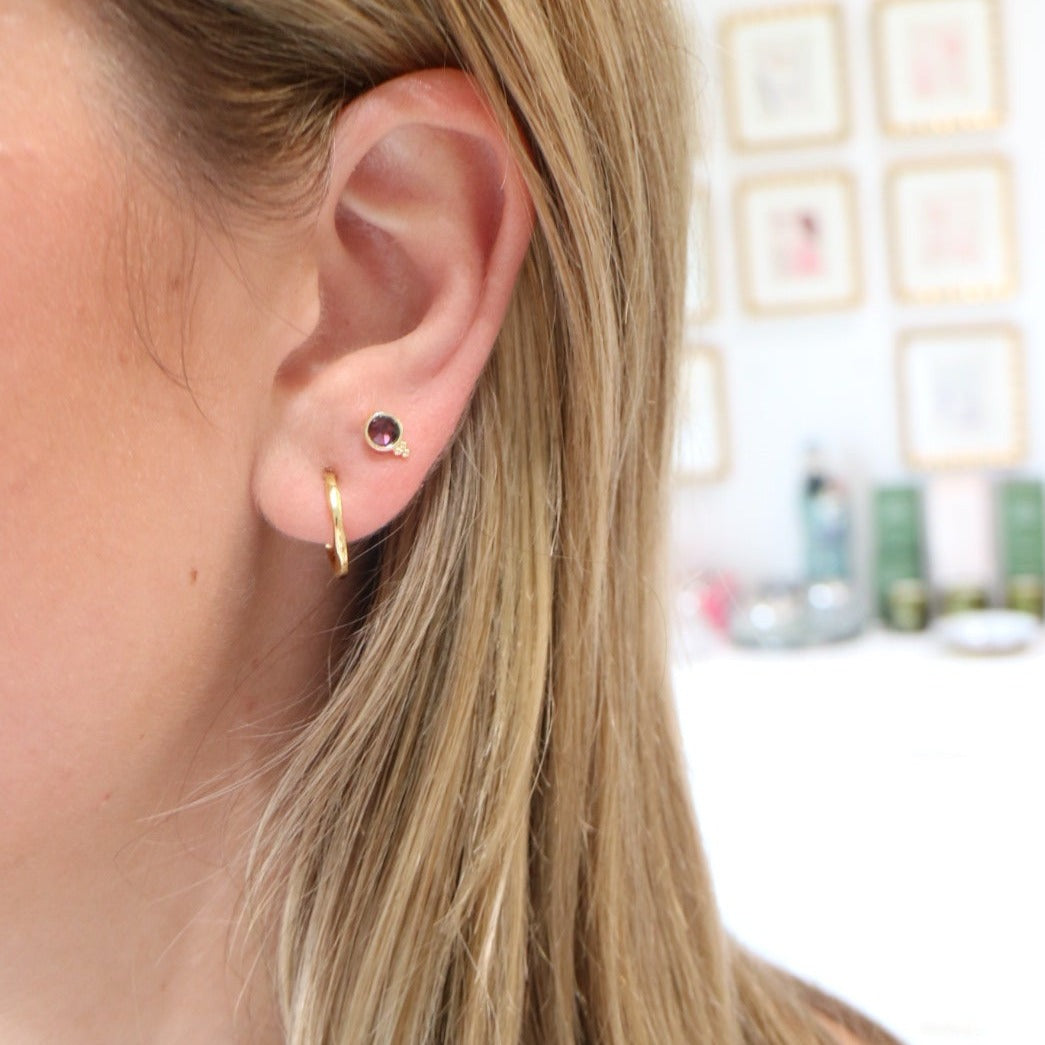 Woman wearing Fortuna Studs by Gresham Jewelry