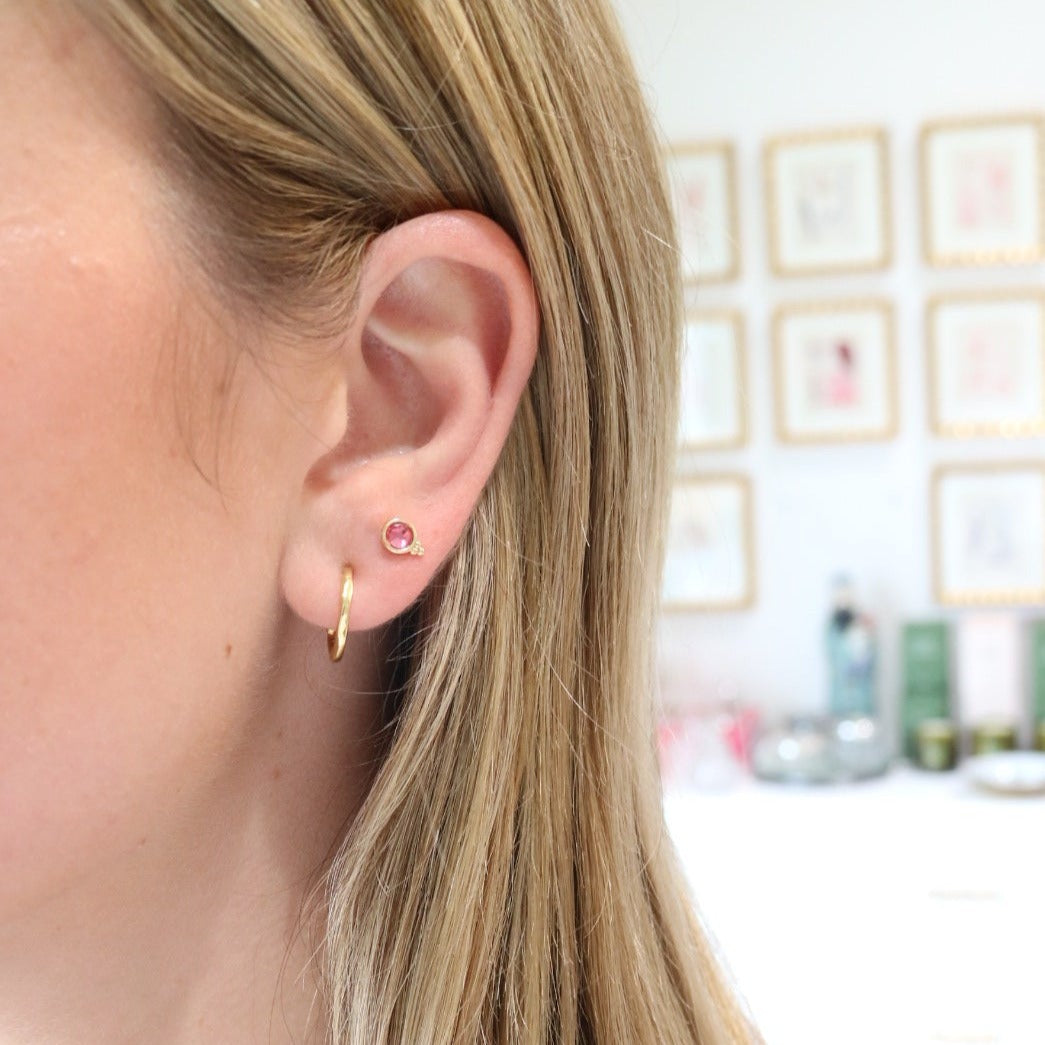 Woman wearing Fortuna Studs by Gresham Jewelry