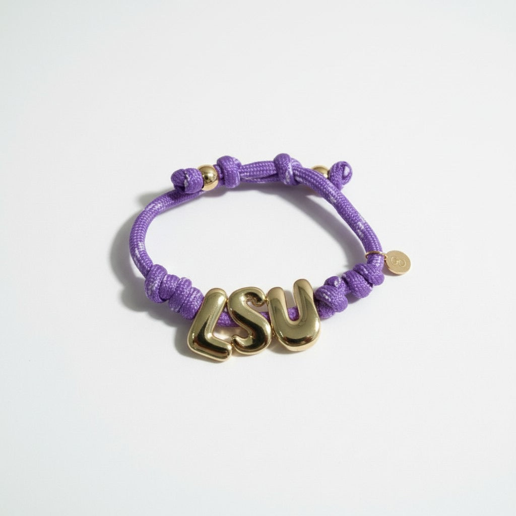 Purple paracord bracelet with gold LSU letters