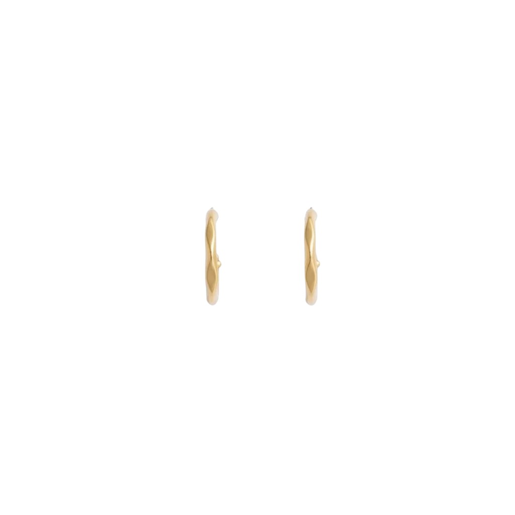 Tiny gold Mia hoop earrings shown from the side