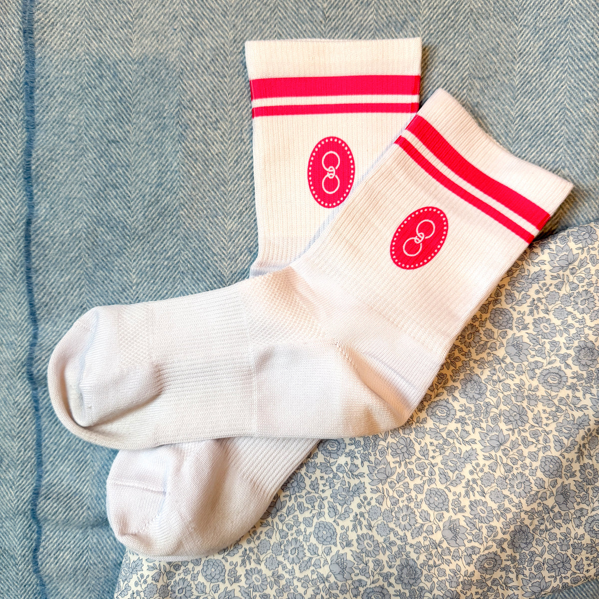 GJ crew socks with bright colored stripes and logos