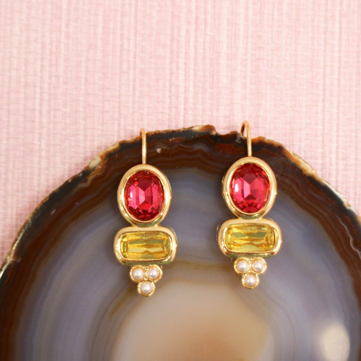 Ella drop earrings with ruby and yellow colored stones and gold details