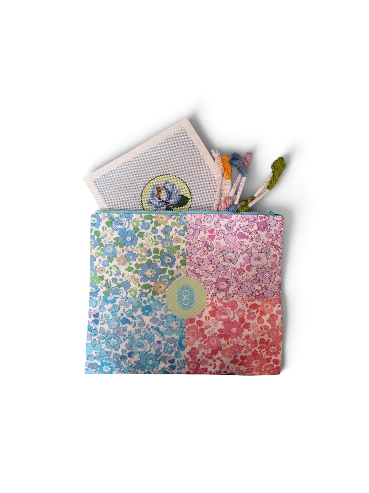 Open floral Liberty Stash Bag holding small everyday items