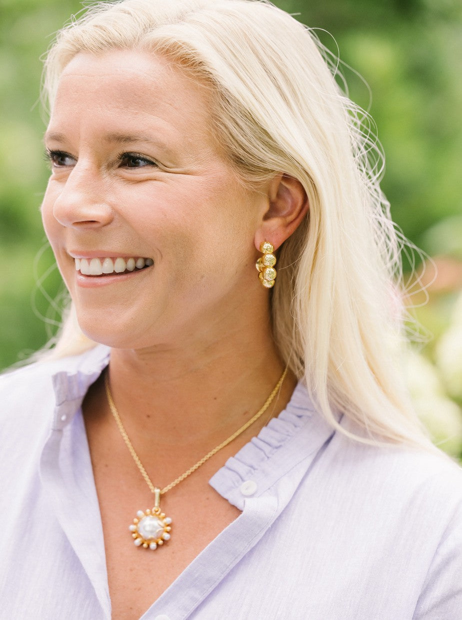 Woman wearing Grande Perla Pendant by Gresham Jewelry