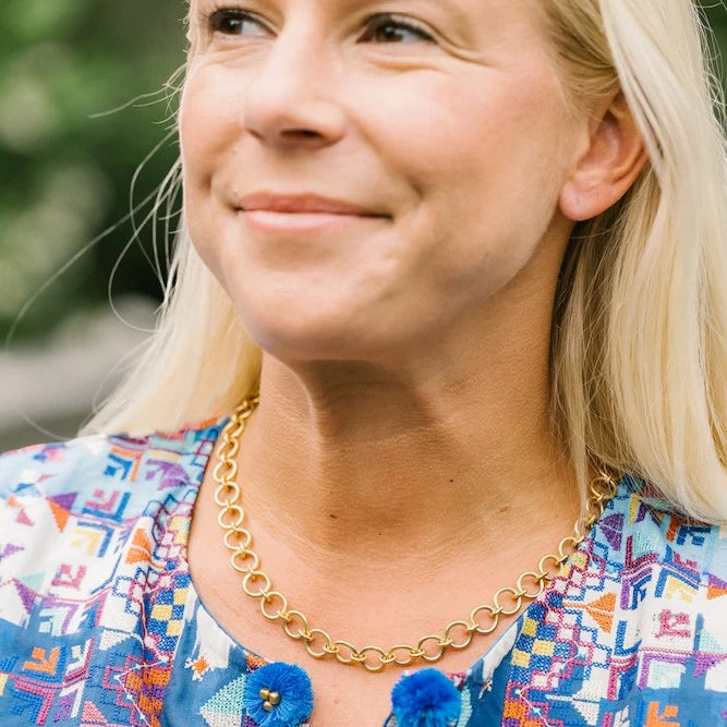 Woman wearing Custom Charm Catena Necklace by Gresham Jewelry