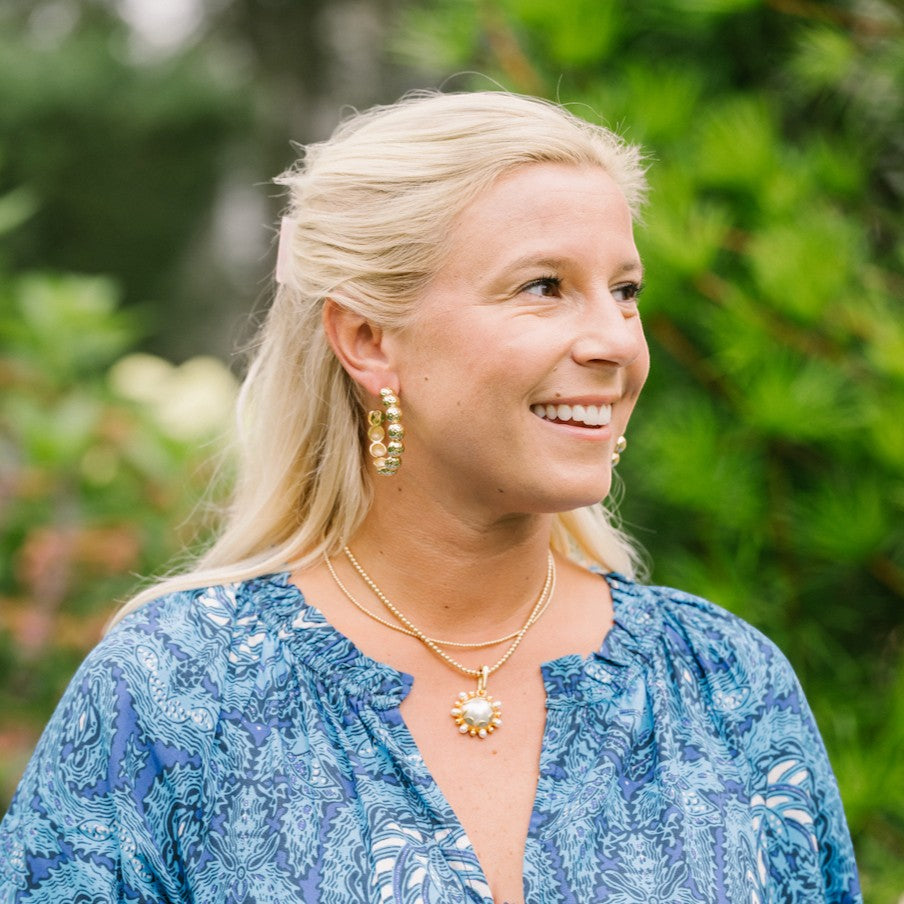 Woman wearing Florence Hoops - Large by Gresham Jewelry
