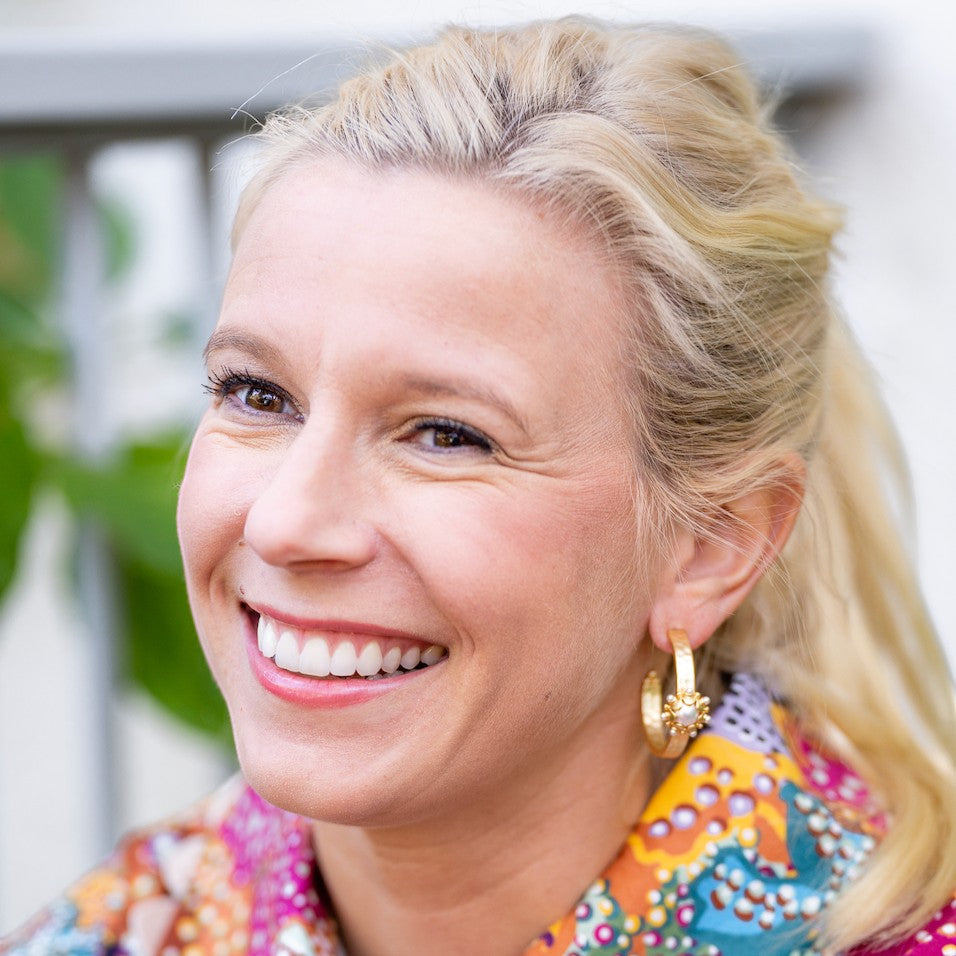 Woman wearing Perla Hoops by Gresham Jewelry