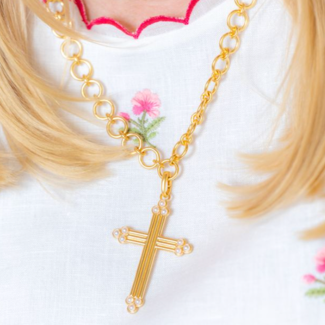 Grande Classica cross pendant worn on layered necklaces