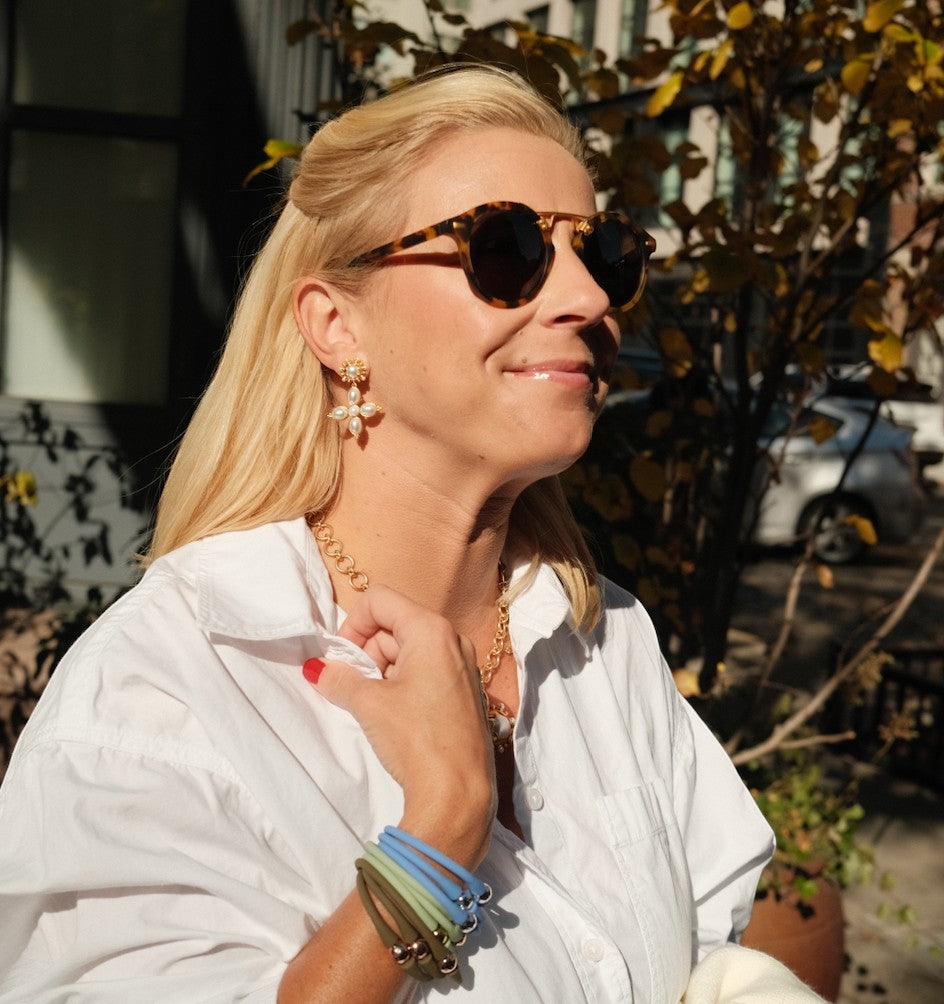 Woman wearing Constance Earrings by Gresham Jewelry