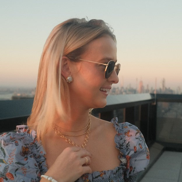 Woman wearing Porto Studs - Pearl by Gresham Jewelry