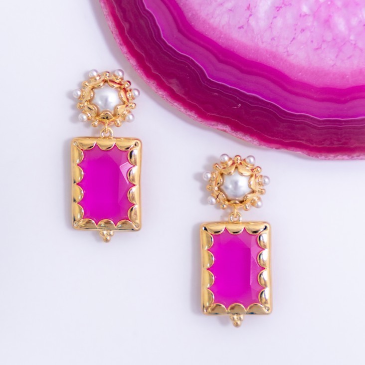 Barbie Pink Mini Gemma earrings on a pink agate slice