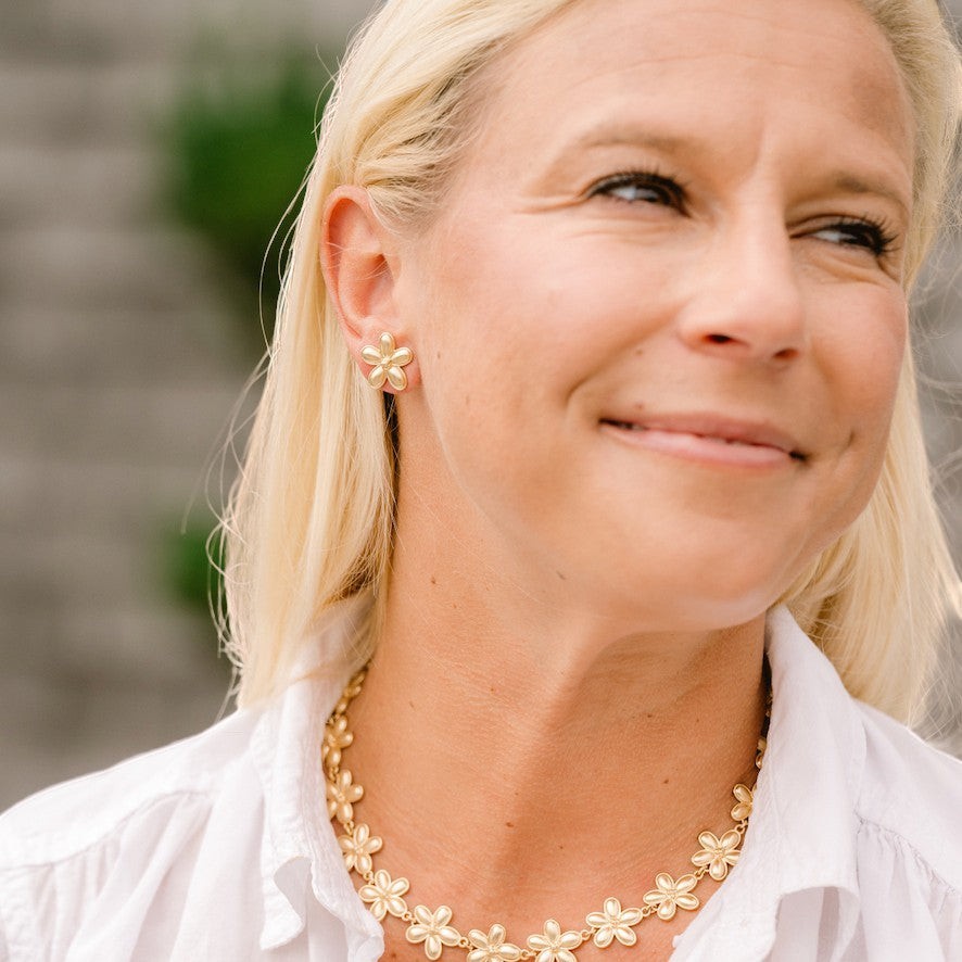 Woman wearing Flora Studs - Gold by Gresham Jewelry