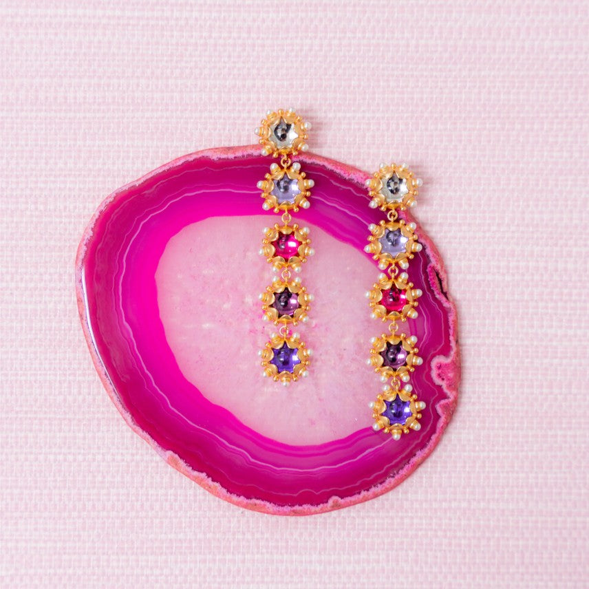 Rose ombre Perla earrings on a pink agate slice