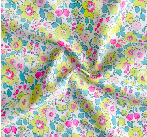 Multicolor floral print fabric on a pale green background