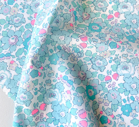 Blue and pink small floral print fabric