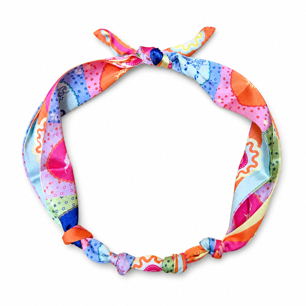 Multicolor Seasons printed scarf tied in a necklace loop