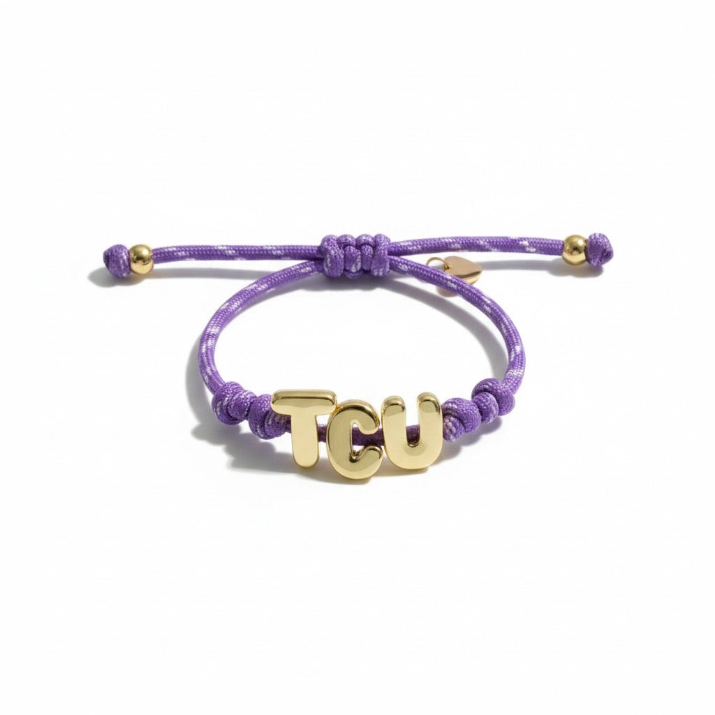 Purple paracord bracelet with gold TCU letters