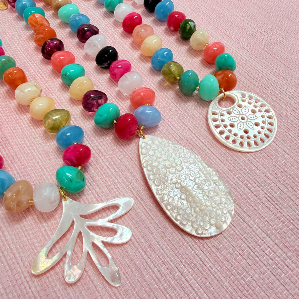 Rainbow Nardo necklaces with three pendant shapes