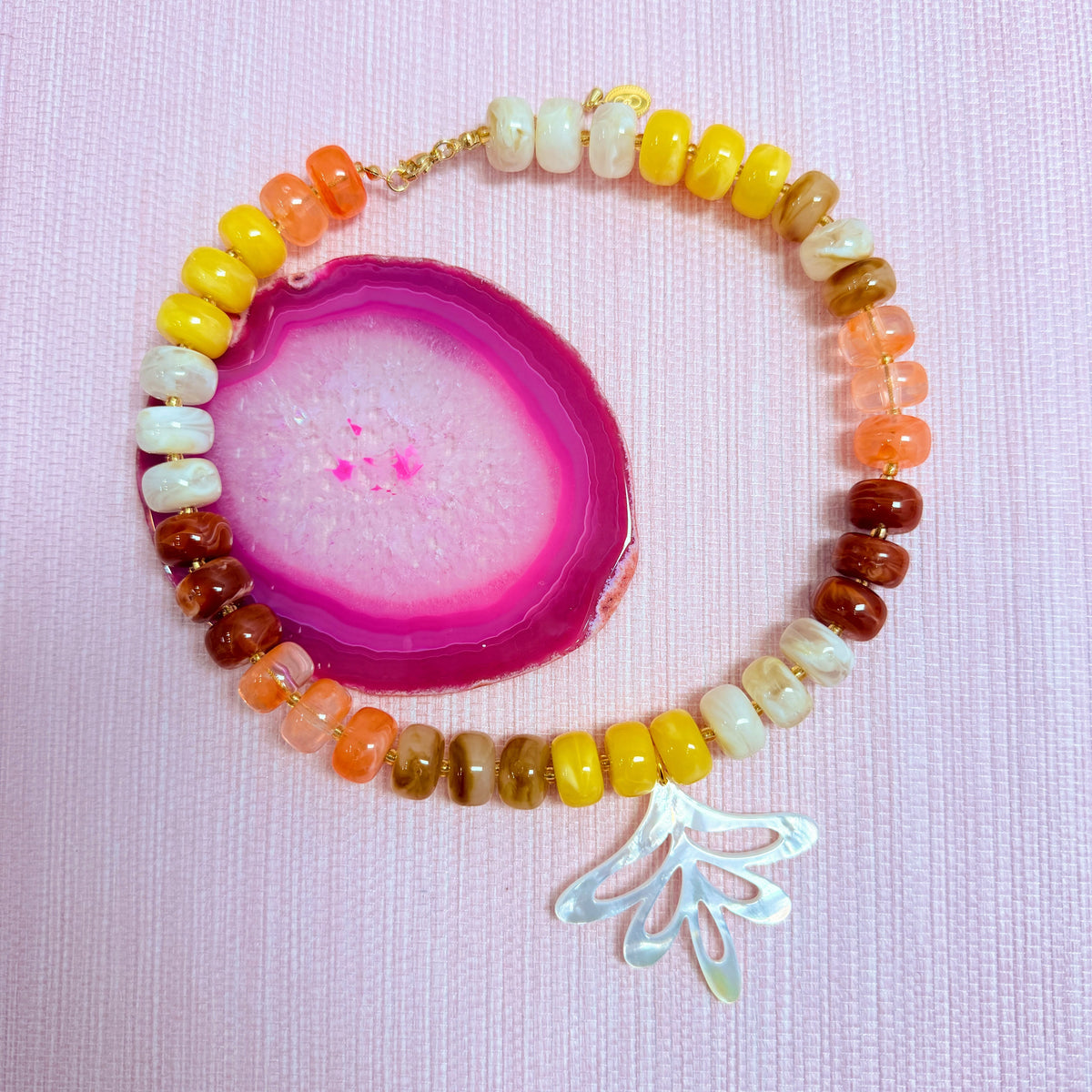 Sunset Nardo necklace with a fan shaped pendant
