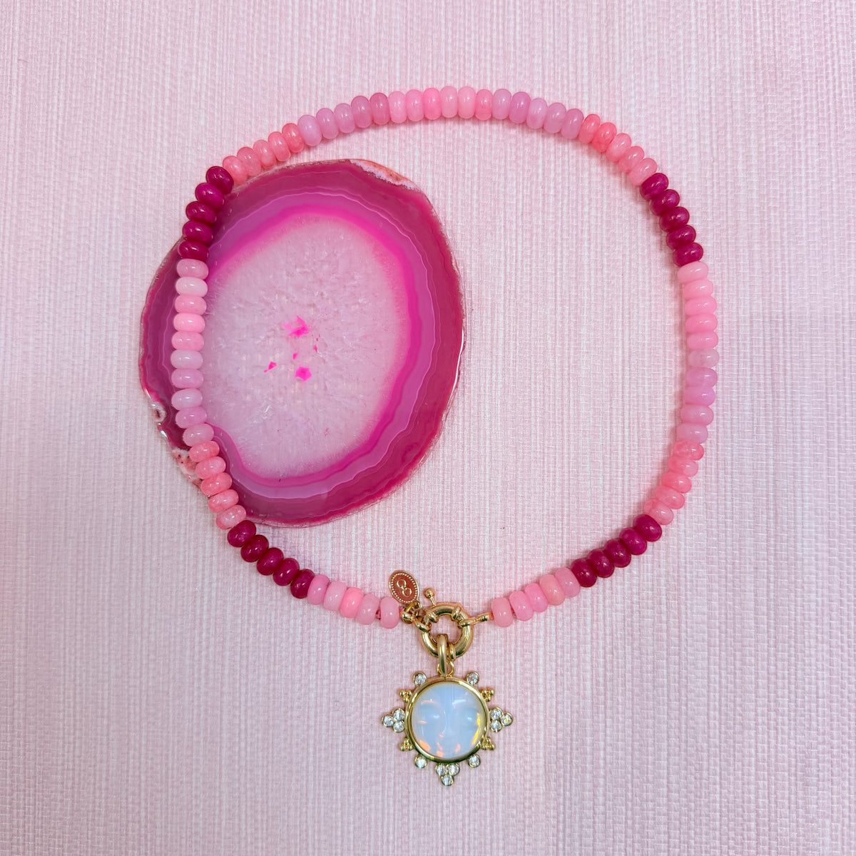 Pink Amalfi beaded necklace with an added round pendant