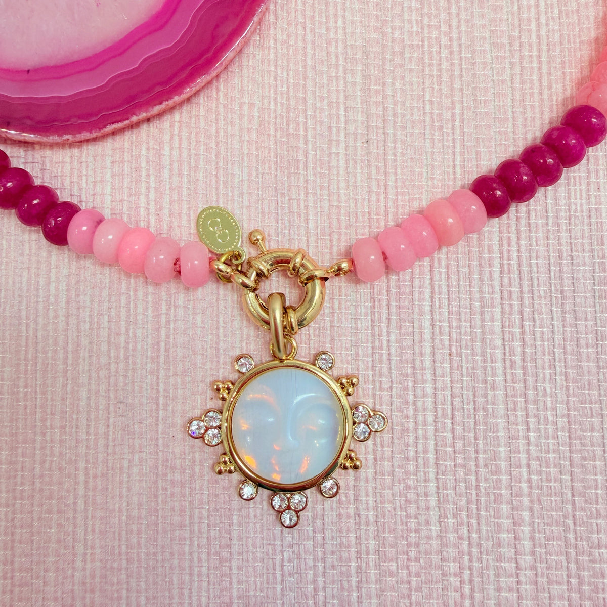 Pink Amalfi necklace styled with a round pendant